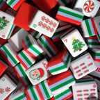 A Christmas-themed mahjong tile set for holiday game nights, festive gifting, and seasonal display. The red, green, and white layered tiles include Christmas trees, candy canes, Santa-style jokers, and other holiday details.