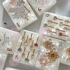 Set of silicone molds with decorative designs on a white surface