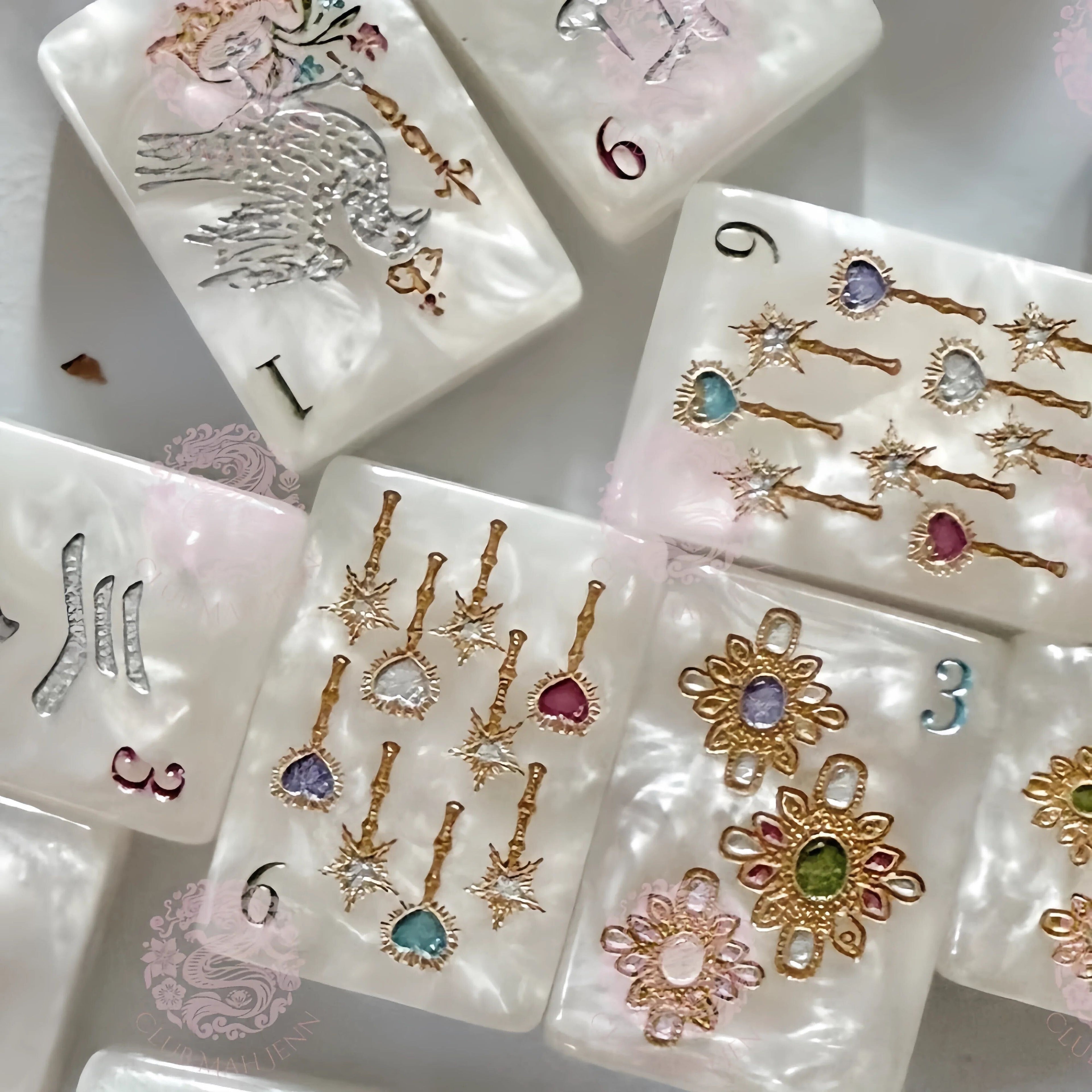 Set of silicone molds with decorative designs on a white surface