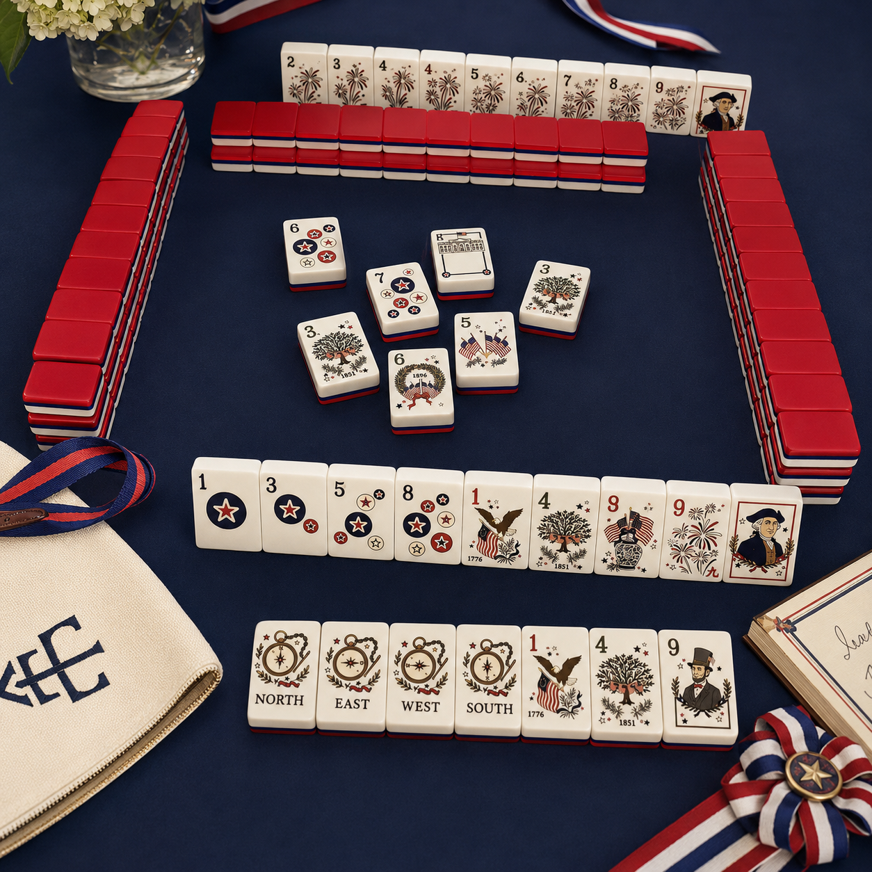 Red white and blue American Mahjong tiles with stars, fireworks, and eagle artwork
